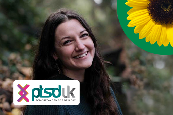Rachel Bilski has white skin and long brown hair. The PTSD UK logo and a yellow sunflower is also in the picture.